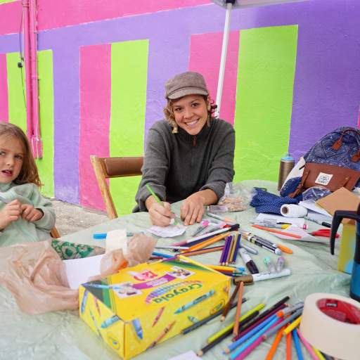A scene from the Skateland Mural Raising Party.