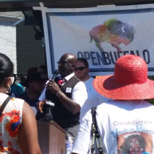 Open Buffalo partners take to the microphone at Massachusetts Avenue Park.