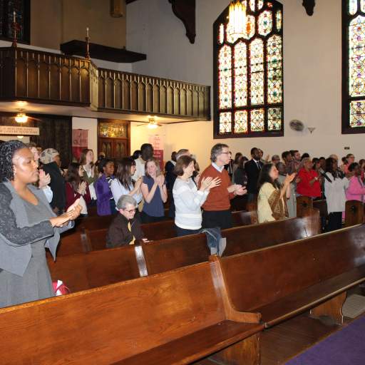 The crowd responds to human rights lawyer Nicole Lee.