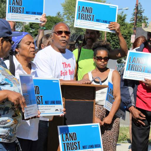 Harvil Hill, president of the Fruit Belt Advisory Council, speaks at the "Land Trust, Not Land Rush" press event.