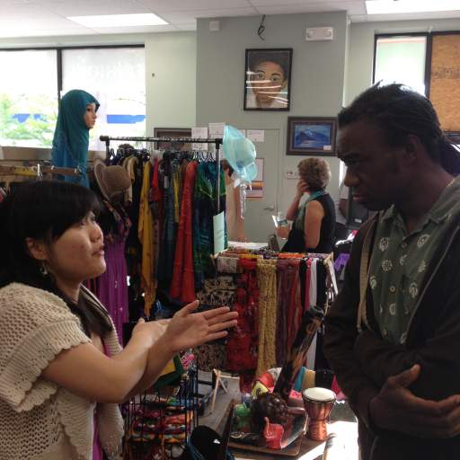 A shop owner talks to Heron about her journey.