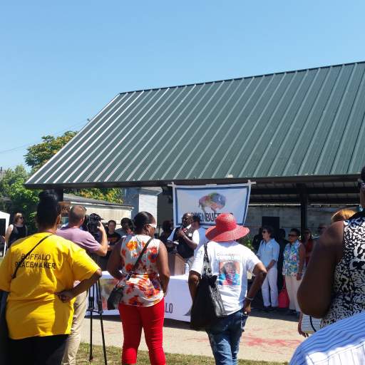 Open Buffalo partners take to the microphone at Massachusetts Avenue Park.