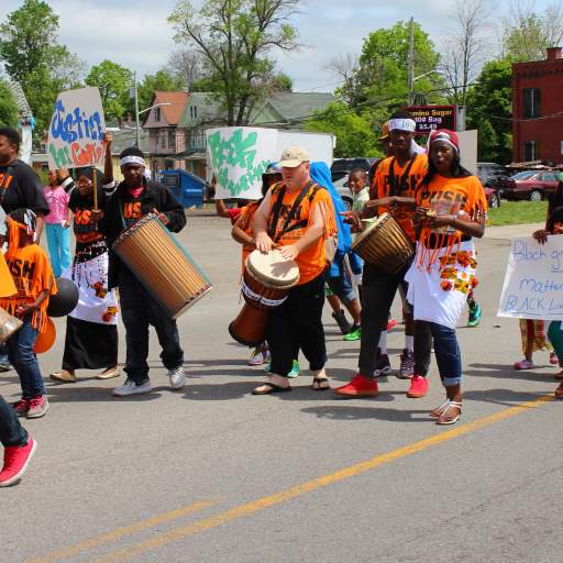 04. The PUSH Buffalo contingent marches and drums down Genesee Street.