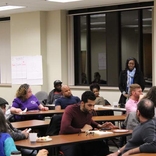 Those who stepped up to be community policing surveyors shared personal stories at the Feb. 23 event.