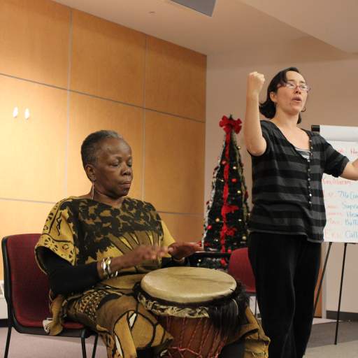 Karima Amin and Sophia Roberts perform a stirring story at Open Buffalo's Emerging Leaders training.