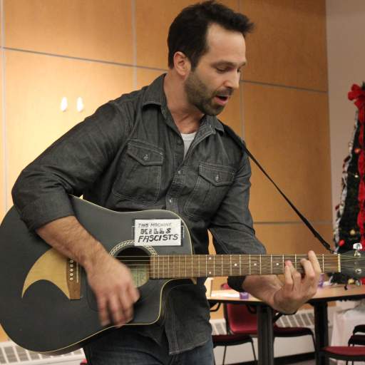Brian Trzeciak performs during the Emerging Leaders talent show.