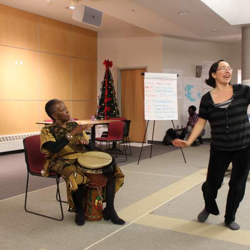 Karima Amin and Sophia Roberts perform a stirring story at Open Buffalo's Emerging Leaders training.