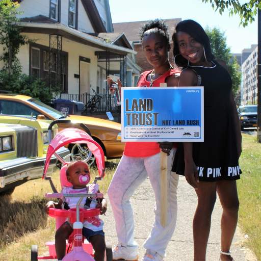 "Land Trust, Not Land Rush!"